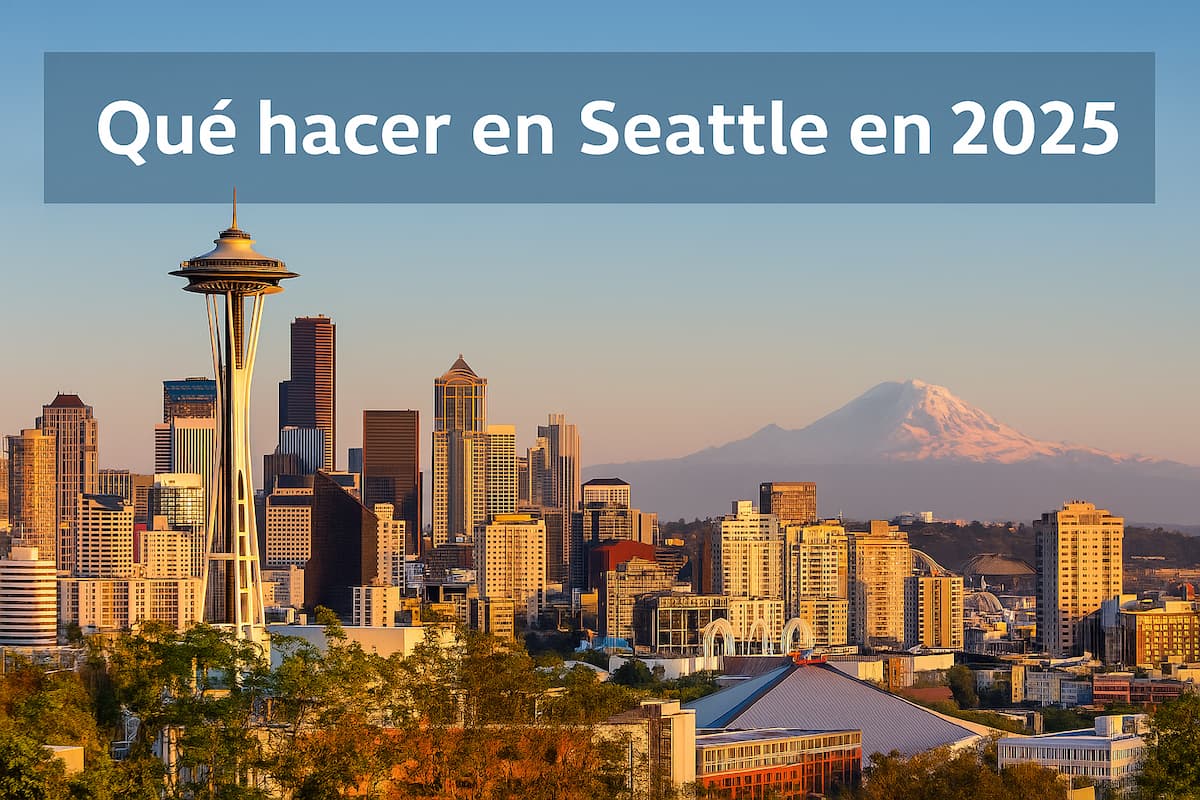 Vista panorámica de Seattle con el volcán nevado Monte Rainier al fondo y el Space Needle en primer plano.